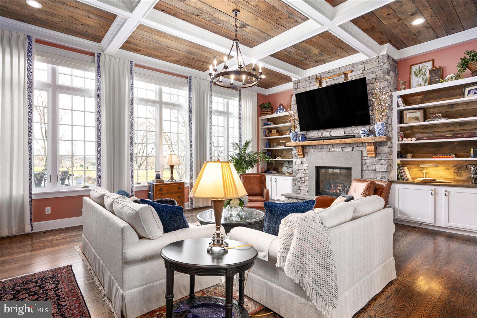 828 Federal Hill Road Street, MD 21154 - Photo 19 of 73 a living room with fireplace furniture and a flat screen tv