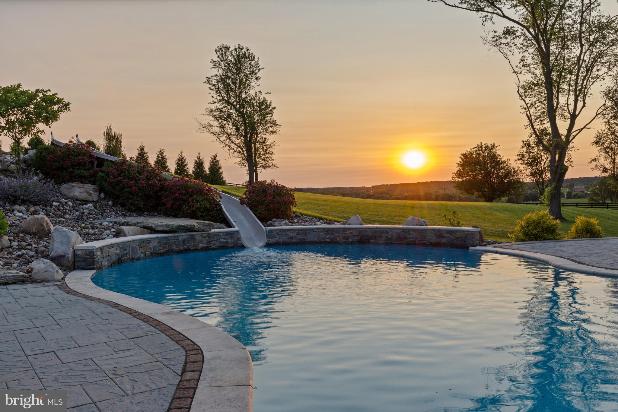 828 Federal Hill Road Street, MD 21154 - Photo 2 of 73 a view of a lake with houses in the back