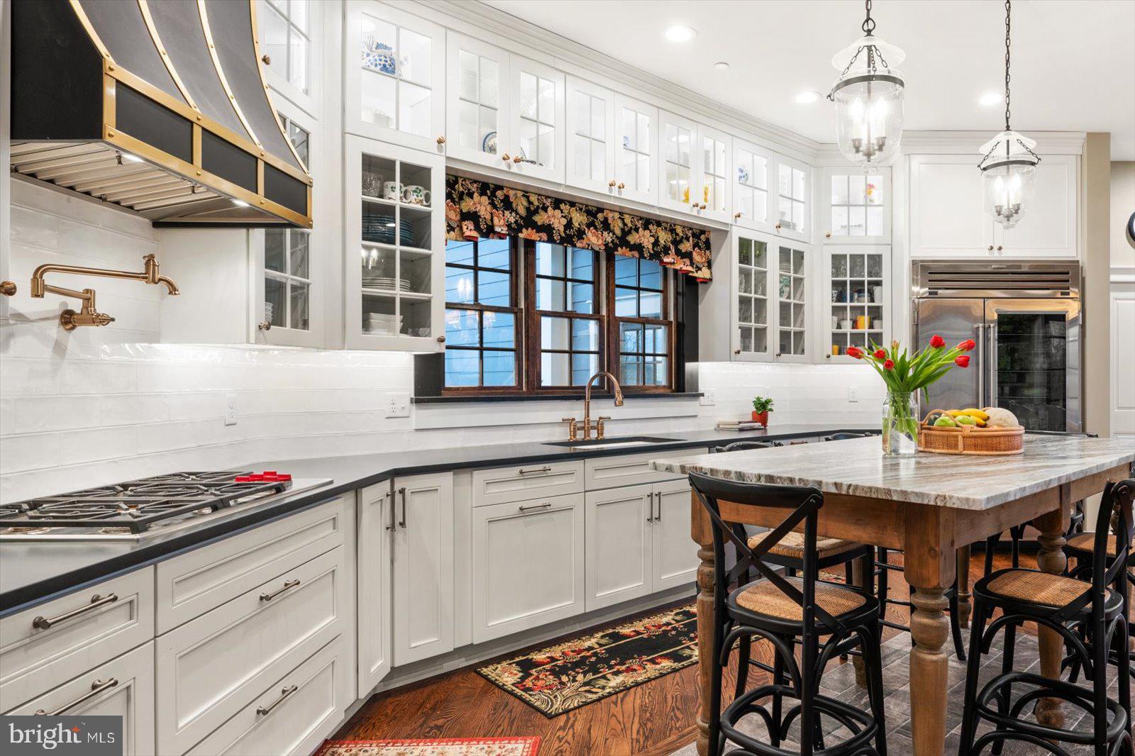 828 Federal Hill Road Street, MD 21154 - Photo 26 of 73 a kitchen with stainless steel appliances granite countertop a stove and cabinets