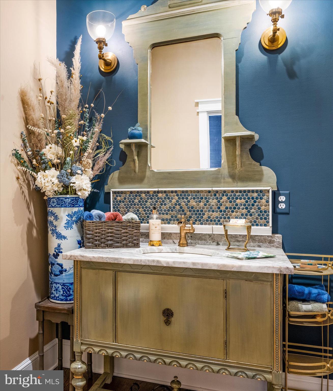 828 Federal Hill Road Street, MD 21154 - Photo 34 of 73 a bathroom with a sink and a mirror