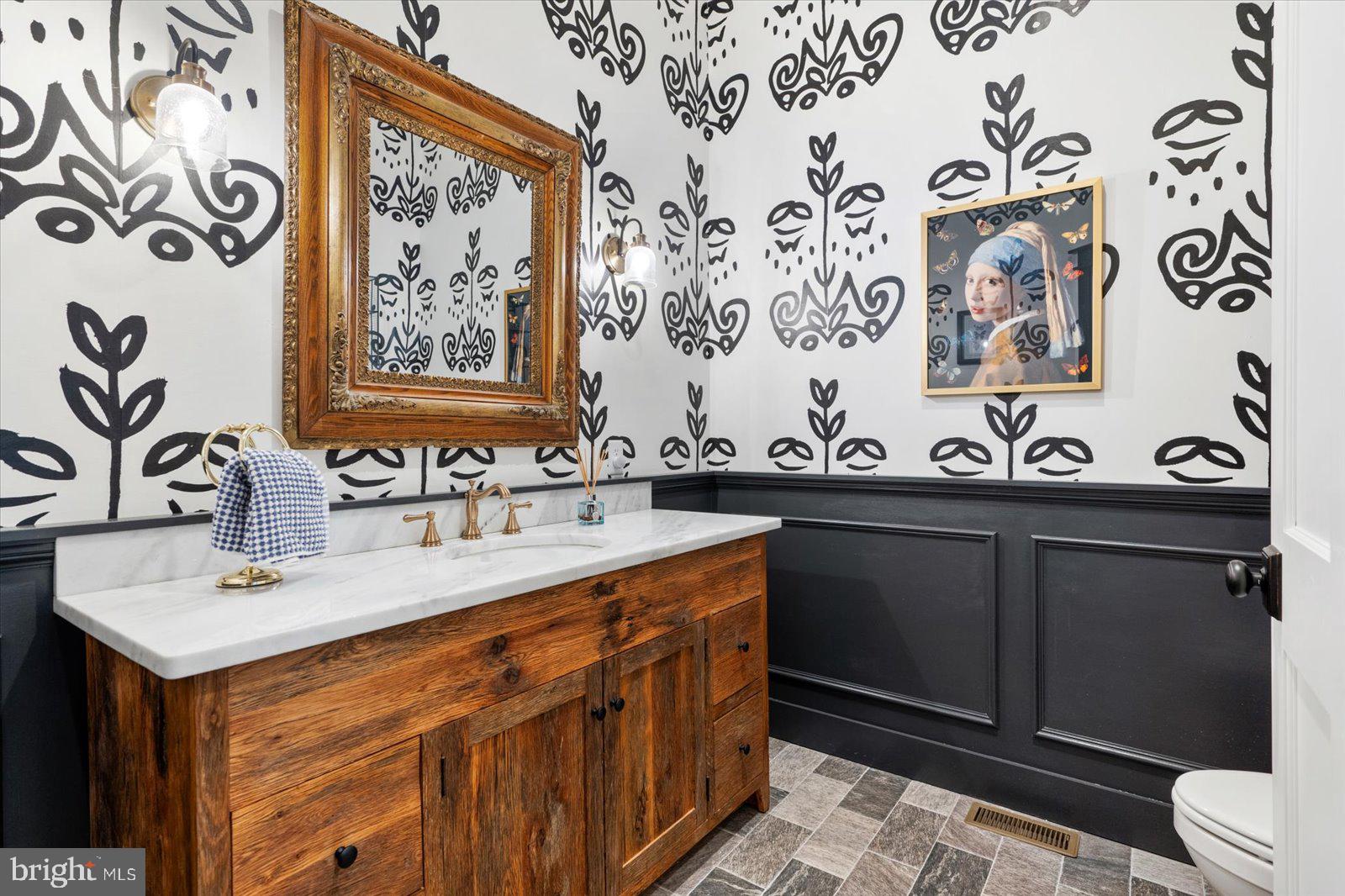 828 Federal Hill Road Street, MD 21154 - Photo 36 of 73 a bathroom with a sink and a mirror