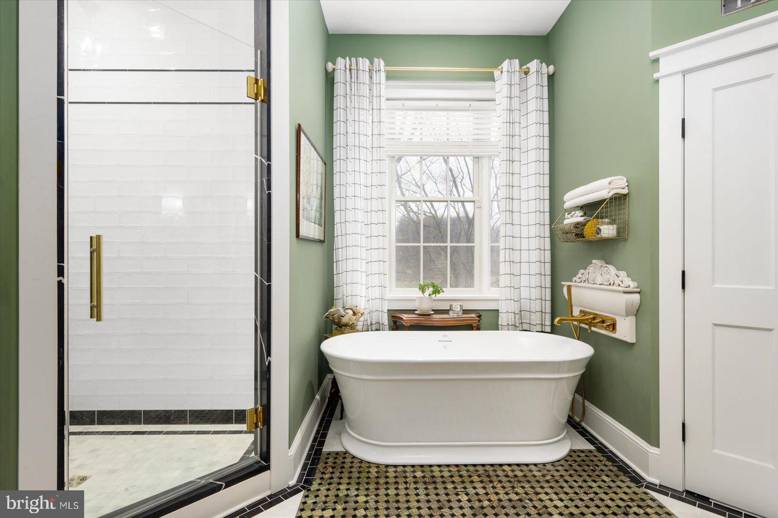 828 Federal Hill Road Street, MD 21154 - Photo 38 of 73 a white bath tub sitting next to a white toilet