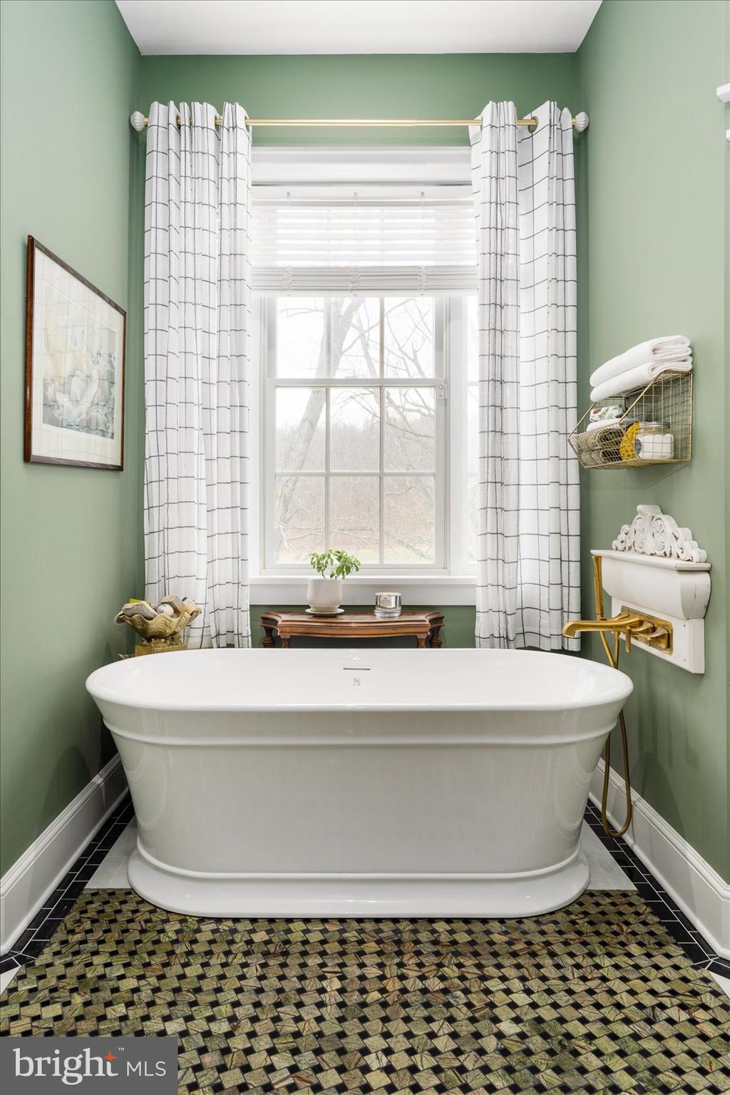 828 Federal Hill Road Street, MD 21154 - Photo 39 of 73 a white bath tub sitting next to a white sink