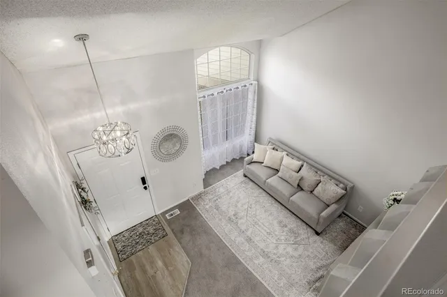 a view of entryway with kitchen