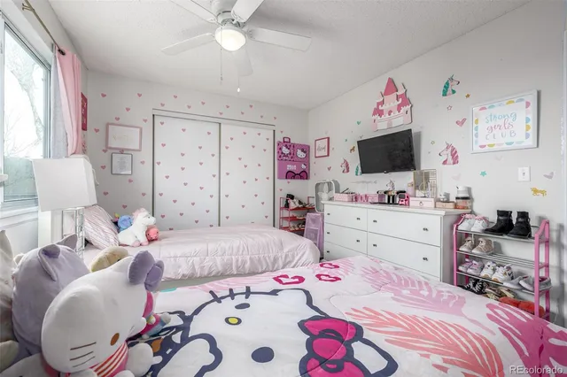 a bathroom with a sink toilet vanity and shower