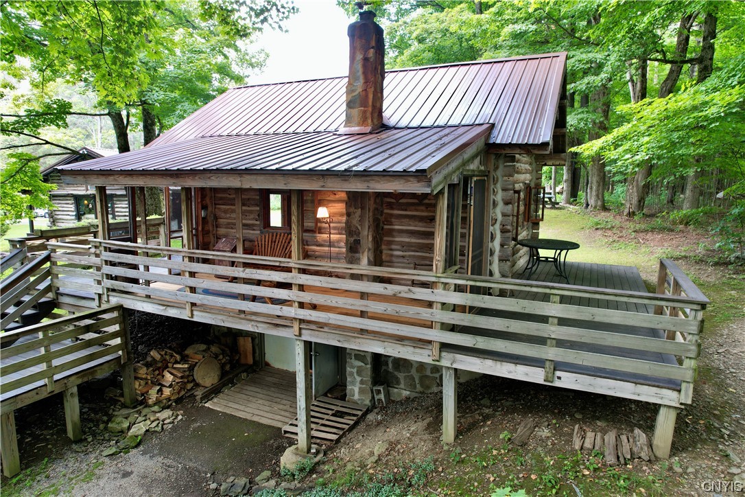 7807 Bonney Hill Road Hamilton, NY 13346 - Photo 25 of 50 Deck and covered porch area of guest cottage. Ther