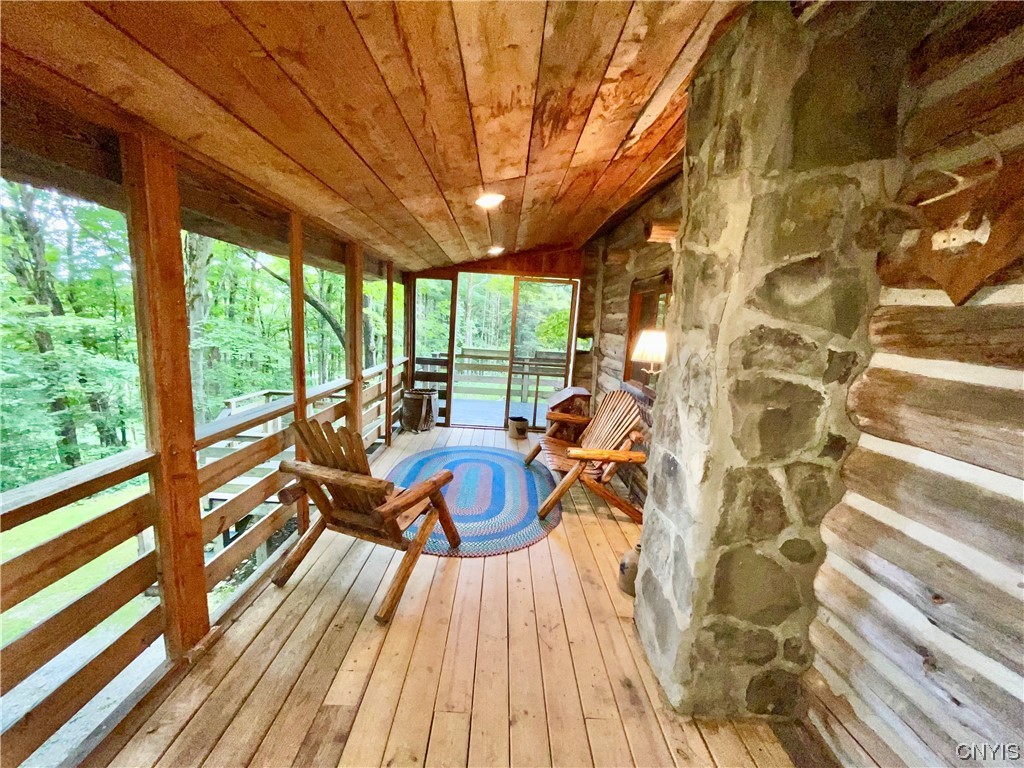 7807 Bonney Hill Road Hamilton, NY 13346 - Photo 35 of 50 Covered porch of guest cottage which also has scre