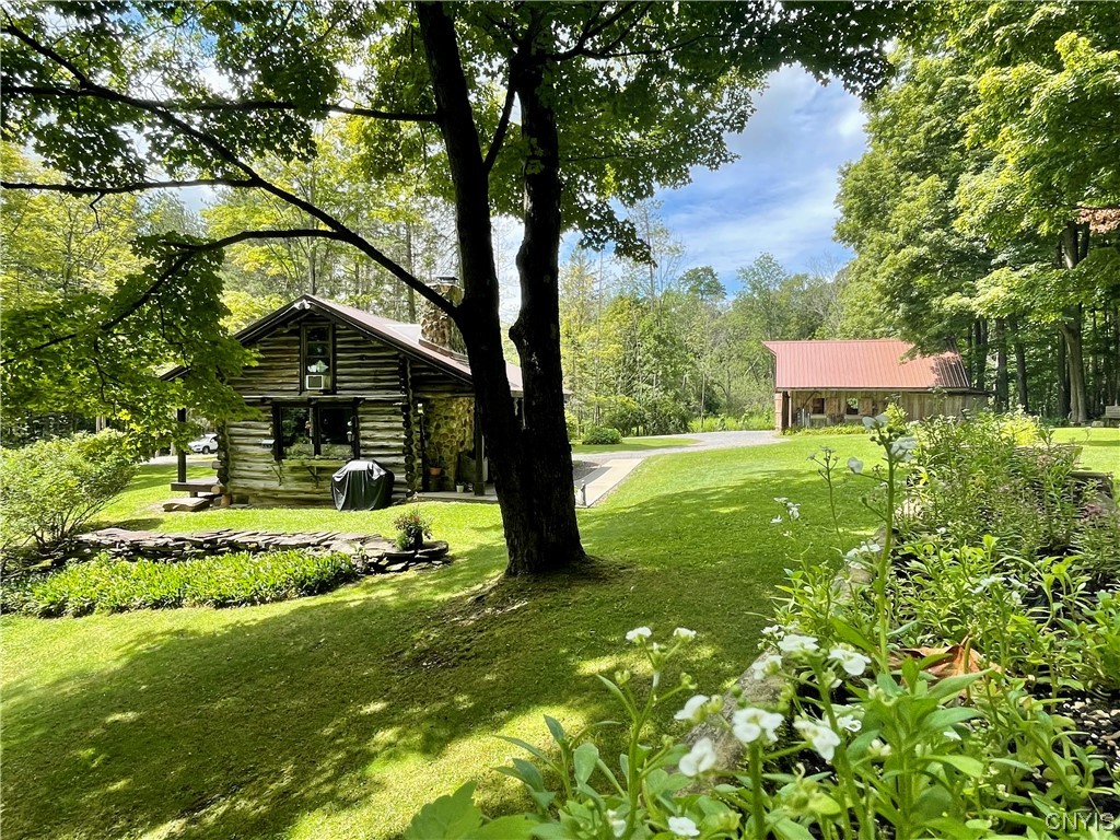 7807 Bonney Hill Road Hamilton, NY 13346 - Photo 37 of 50 View from guest cottage of main cabin and barn