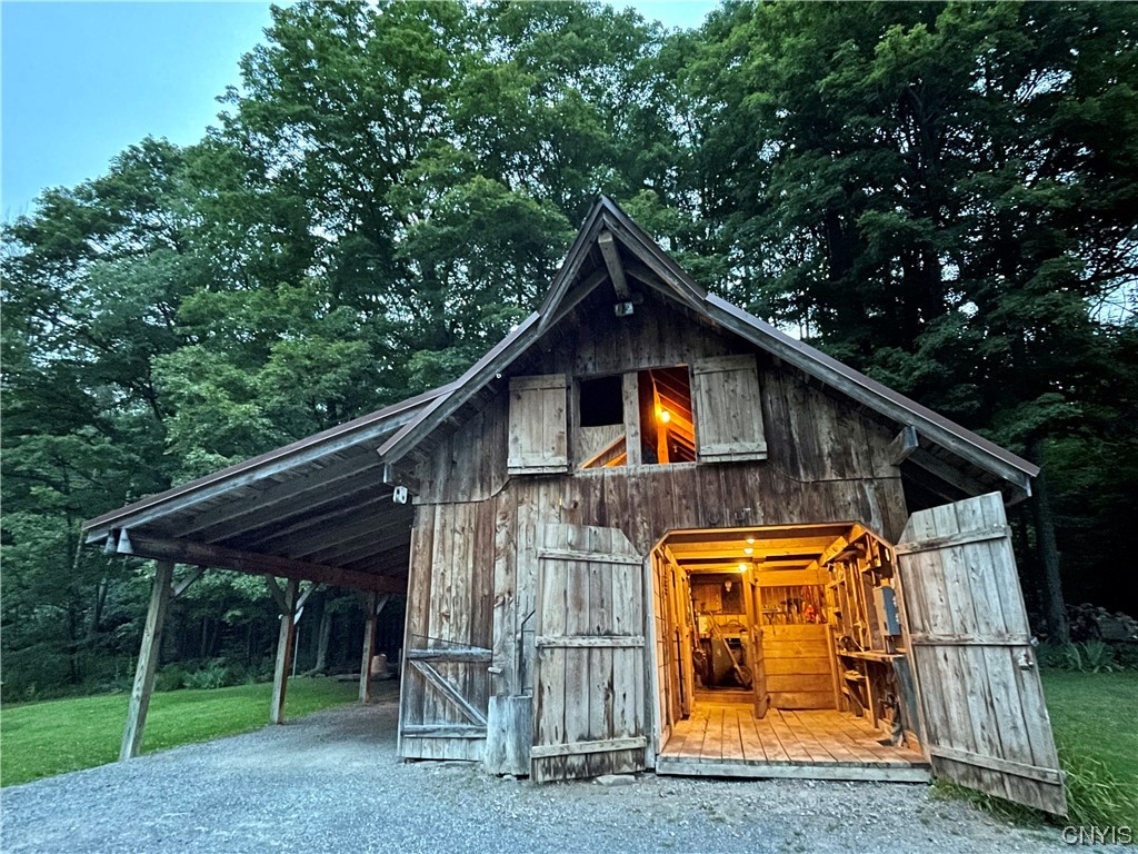 7807 Bonney Hill Road Hamilton, NY 13346 - Photo 45 of 50 View of the barn at dusk