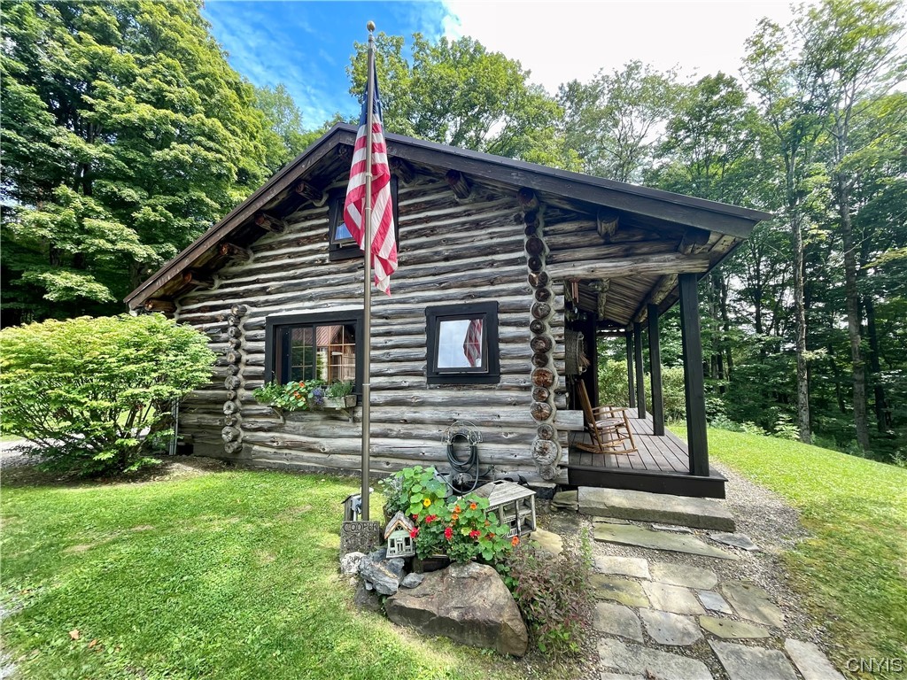 7807 Bonney Hill Road Hamilton, NY 13346 - Photo 6 of 50 Drilled well located under flowers just right of f
