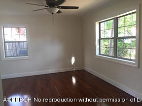 215 Beverly Road West Palm Beach, FL 33405 - Photo 3 of 7 a view of an empty room with a window