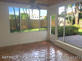 215 Beverly Road West Palm Beach, FL 33405 - Photo 5 of 7 a view of a porch with a yard