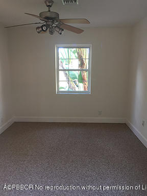 215 Beverly Road West Palm Beach, FL 33405 - Photo 6 of 7 a view of a window in an empty room