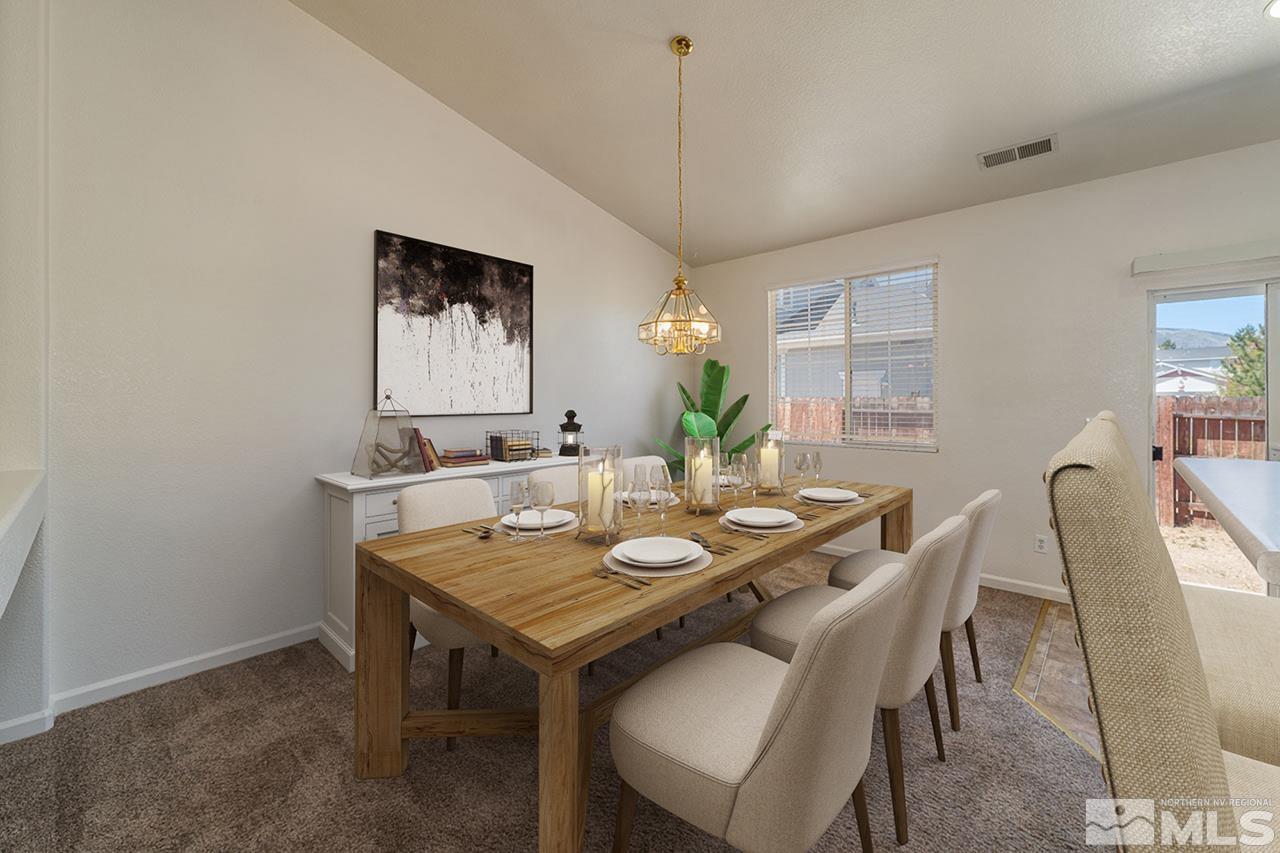 9025 Andraste Way Reno, NV 89506 - Photo 11 of 31 a view of a dining room with furniture and window