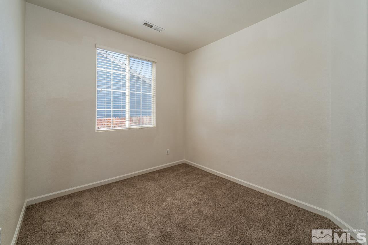 9025 Andraste Way Reno, NV 89506 - Photo 23 of 31 an empty room with a window