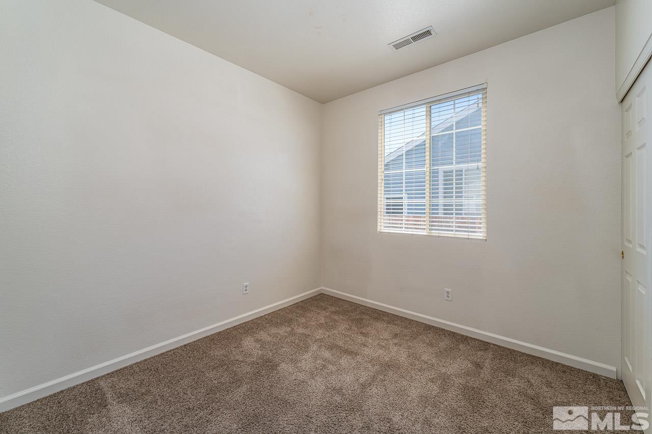 9025 Andraste Way Reno, NV 89506 - Photo 26 of 31 an empty room with a window