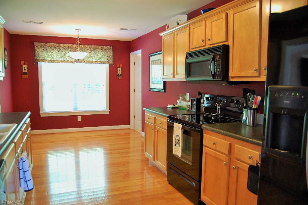 1883 South Union Grove Road Lexington, NC 27295 - Photo 12 of 30 Modern kitchen with sunny breakfast nook.