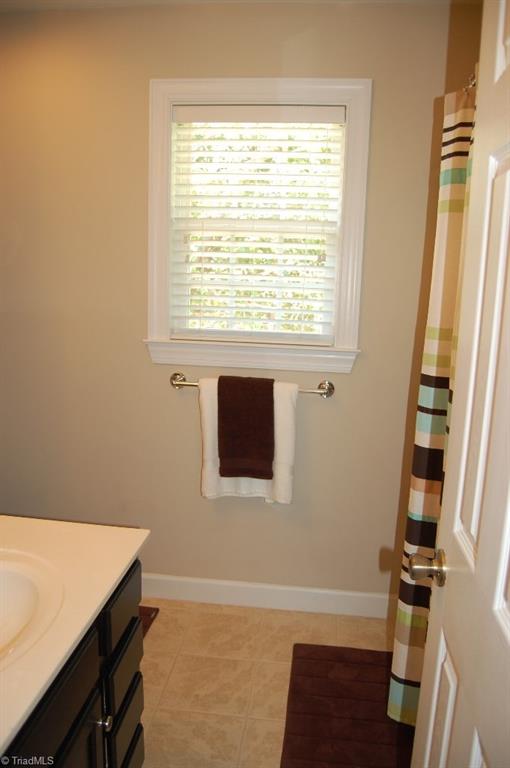 1883 South Union Grove Road Lexington, NC 27295 - Photo 14 of 30 One of 3 full baths in this home located in the hallway to BD's 2 and 3. Throne is to the left.
