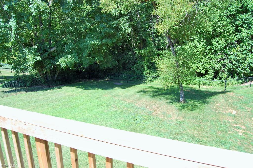1883 South Union Grove Road Lexington, NC 27295 - Photo 28 of 30 Fenced yard from deck view. Lots of sun for garden space and shade for kiddos, Fido, or hammock!