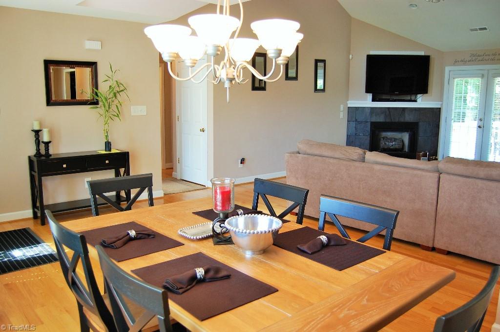 1883 South Union Grove Road Lexington, NC 27295 - Photo 6 of 30 Dining space opening to Living area w/ fireplace and a TV nook wired for your flat screen.