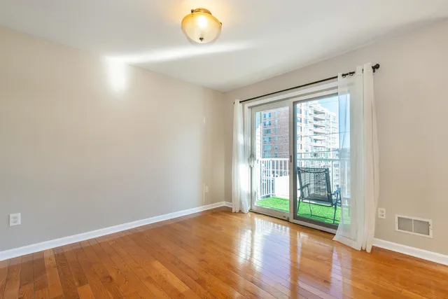 a view of an empty room and window