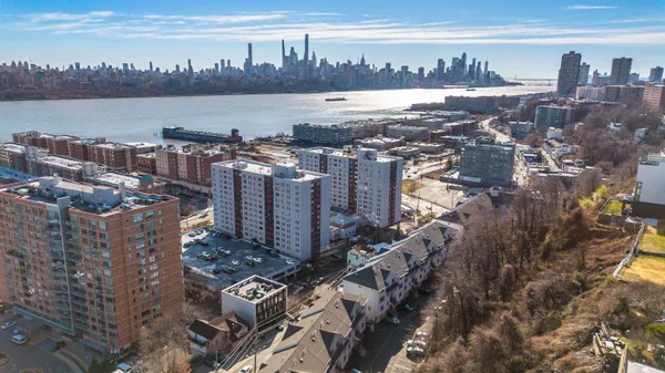 a view of a city with ocean
