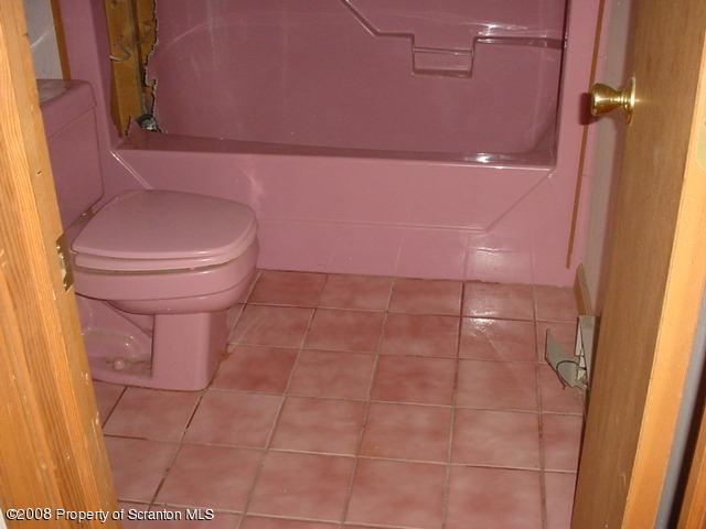 172 Spudeno Rd Tr Factoryville, PA 18419 - Photo 6 of 6 a bathroom with a toilet and a shower