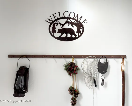 a front view of a house with trees