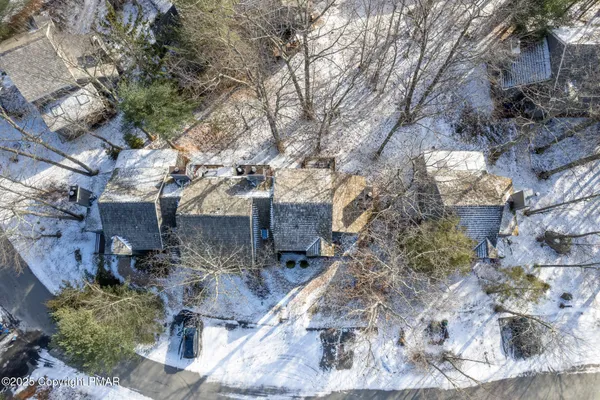 a view of multiple houses with outdoor space