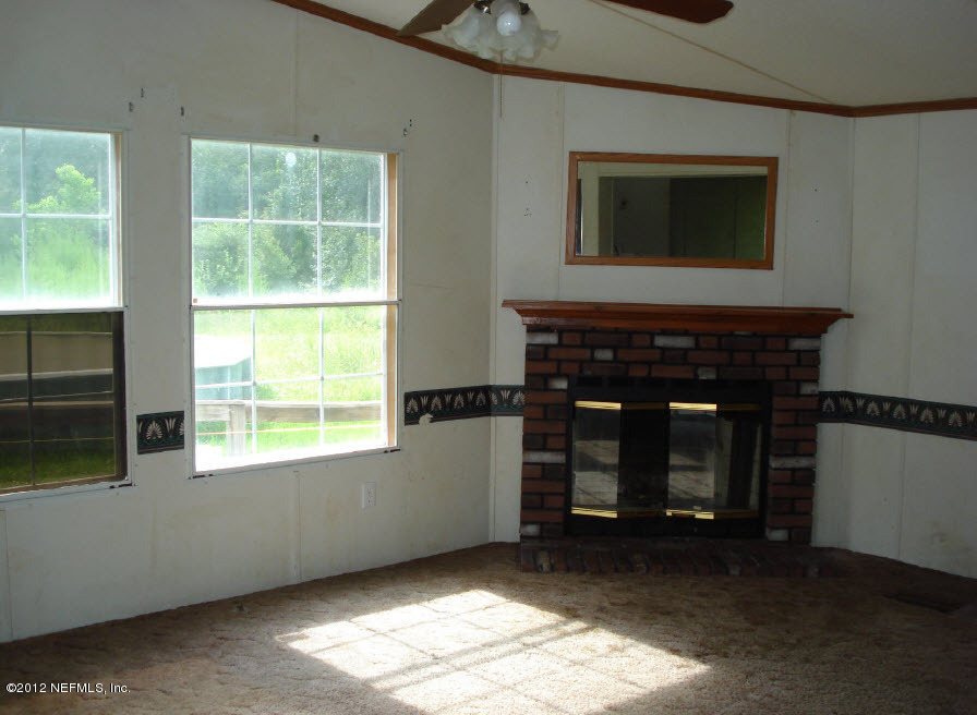 4450 Lori Loop Road Keystone Heights, FL 32656 - Photo 4 of 10 Family rm