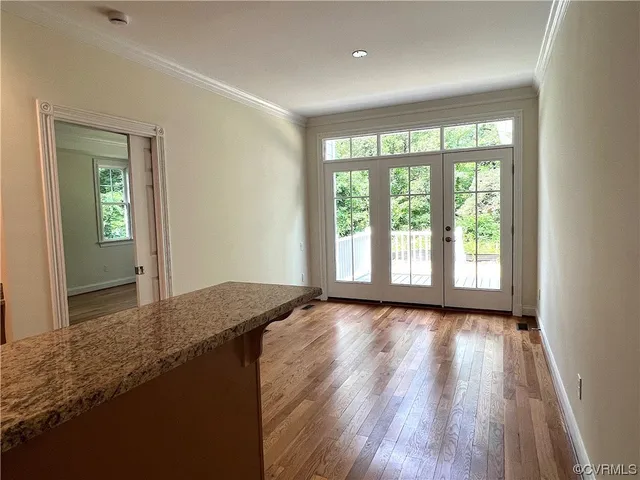 a view of an empty room and window