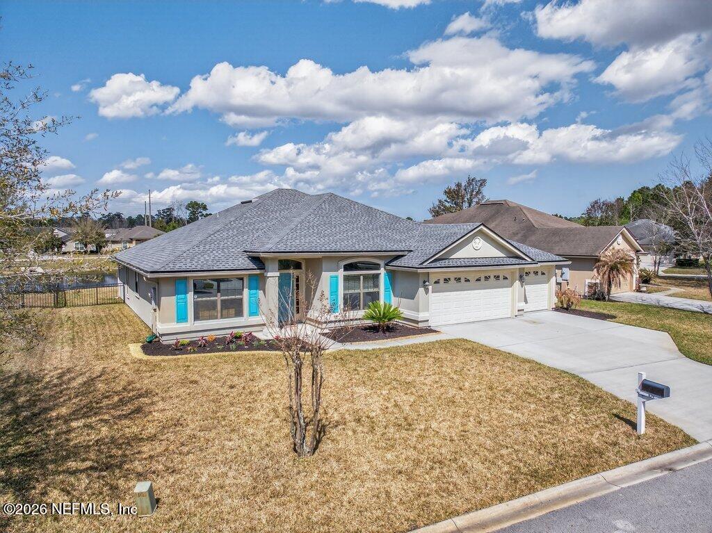 109 Cummer Way St. Augustine, FL 32095 - Photo 37 of 42 front view of house with a yard