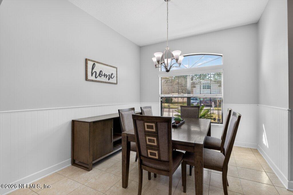 109 Cummer Way St. Augustine, FL 32095 - Photo 8 of 42 a view of a dining room with furniture window and outside view