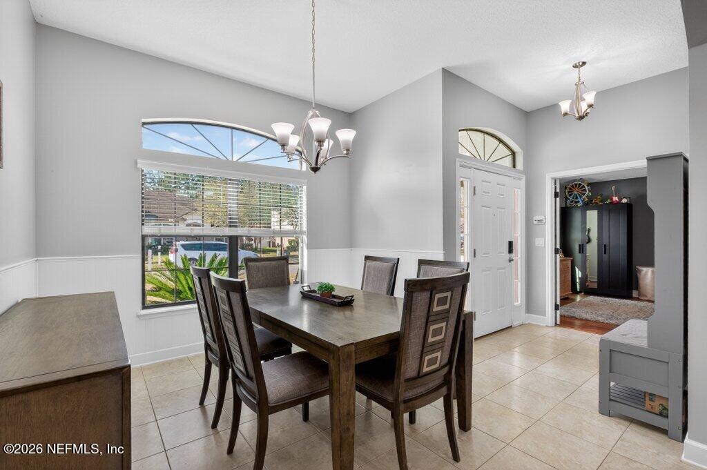 109 Cummer Way St. Augustine, FL 32095 - Photo 9 of 42 a view of a dining room with furniture window and outside view
