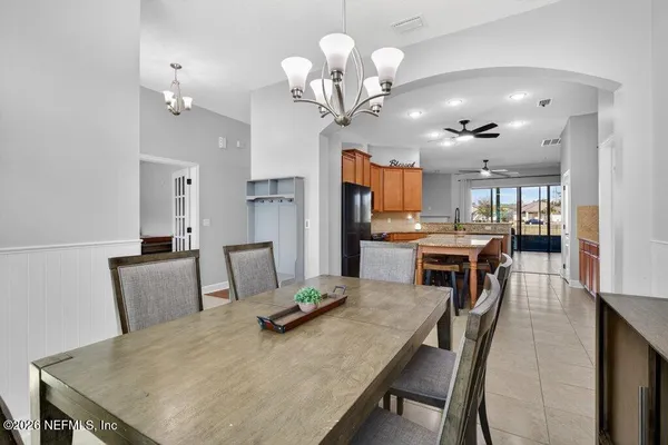 a living room with furniture fireplace and flat screen tv