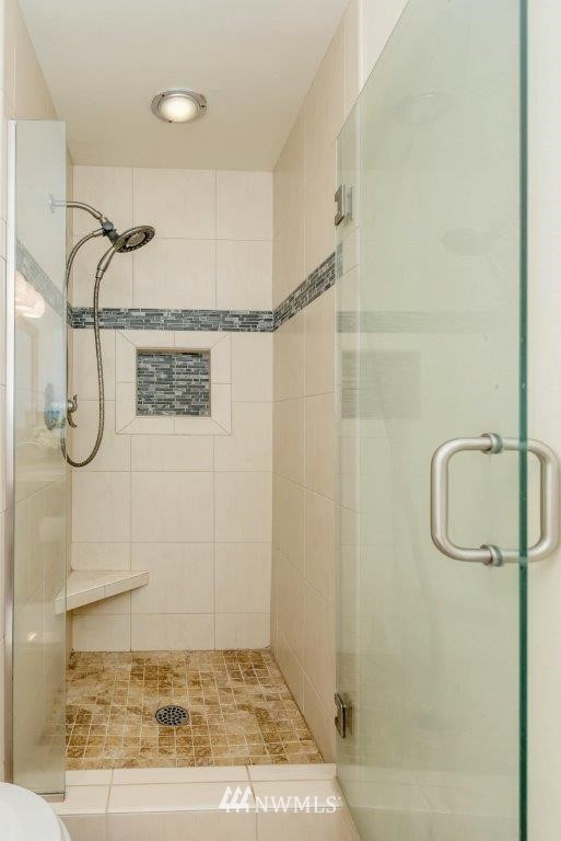 12525 Southeast 99th Street Renton, WA 98056 - Photo 19 of 33 a bathroom with a shower