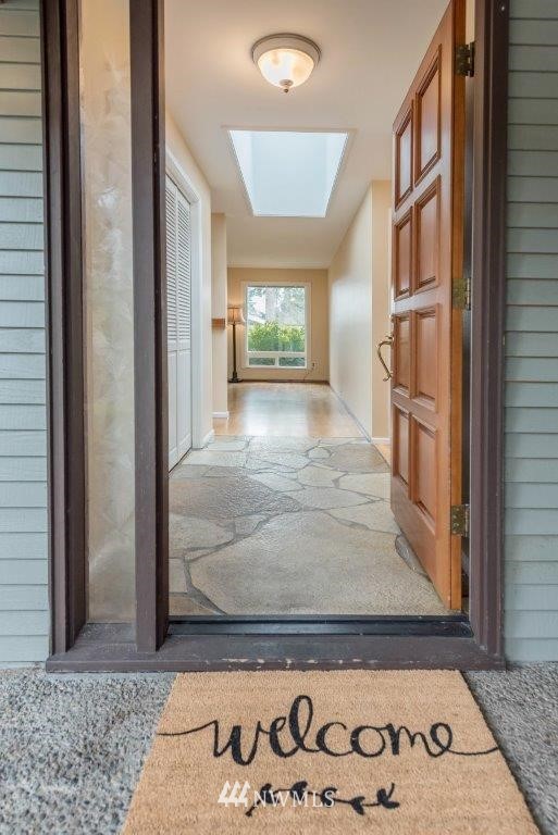 12525 Southeast 99th Street Renton, WA 98056 - Photo 3 of 33 a view of an entryway