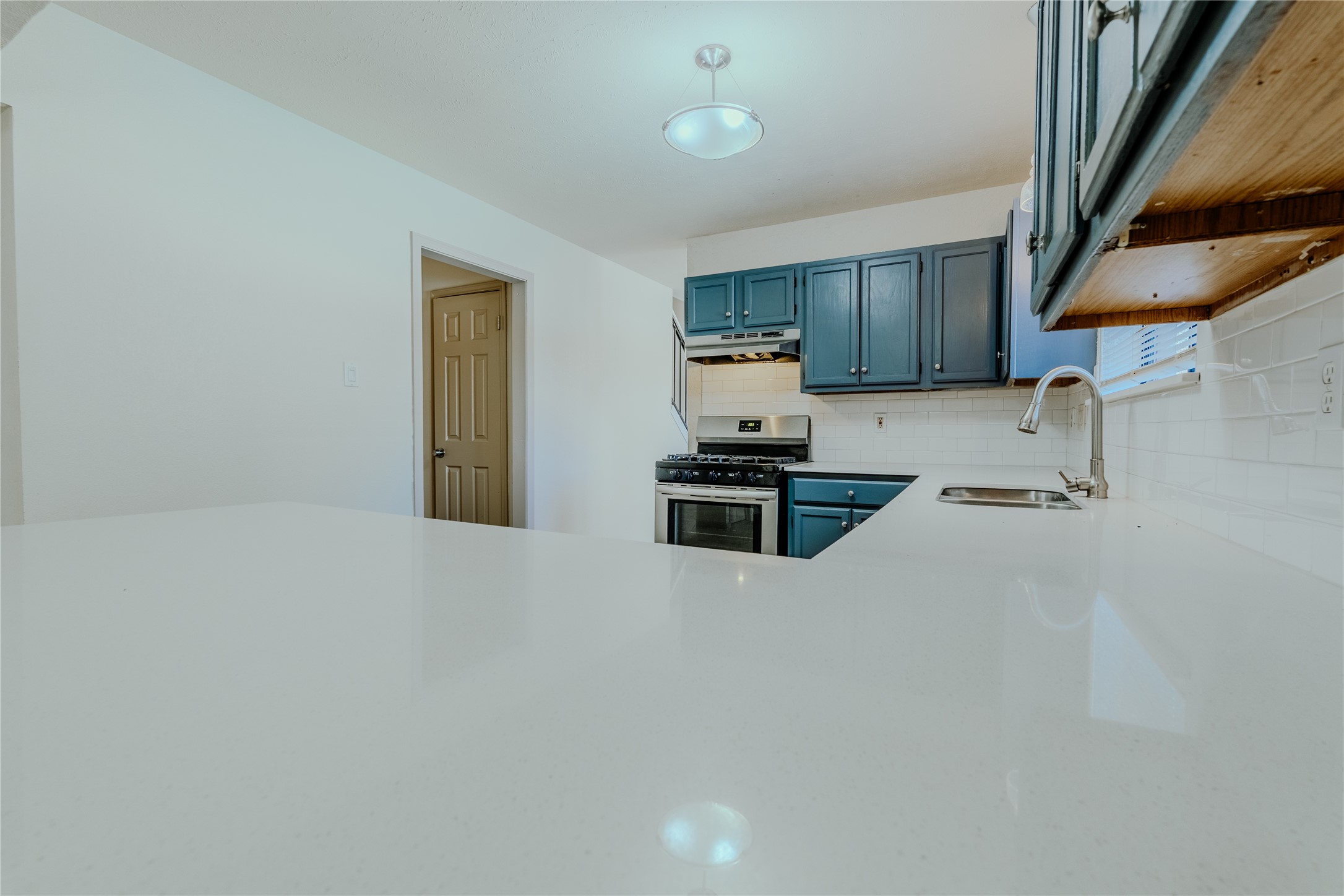 17030 Kirkchapel Street Spring, TX 77379 - Photo 12 of 28 a kitchen with stainless steel appliances a refrigerator and a sink
