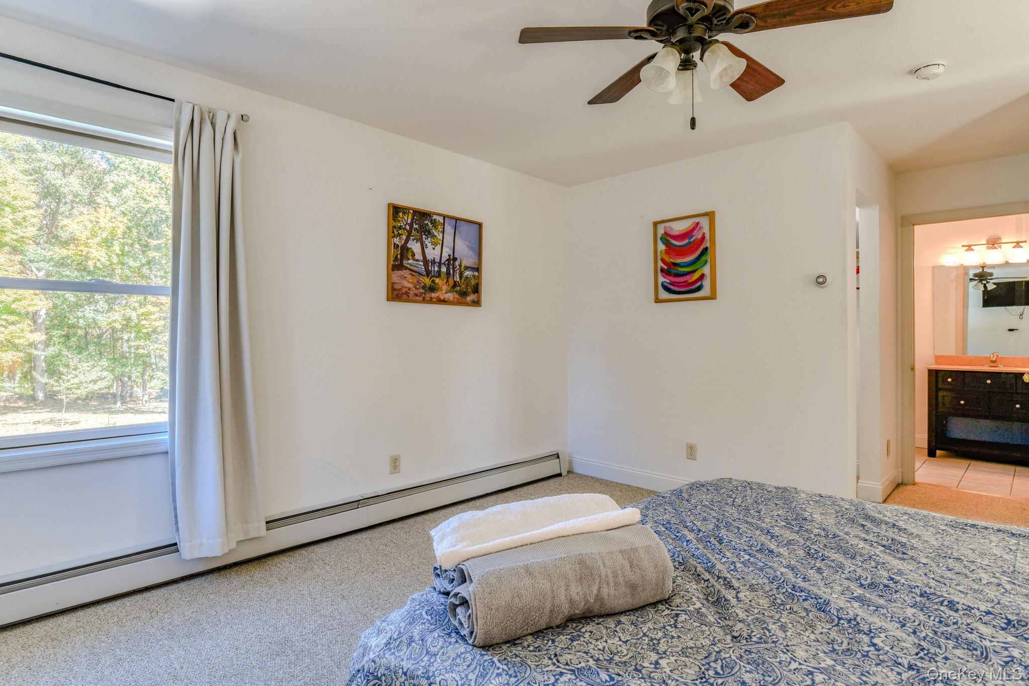 54 Borden Road Walden, NY 12586 - Photo 24 of 46 a bedroom with bed and a window