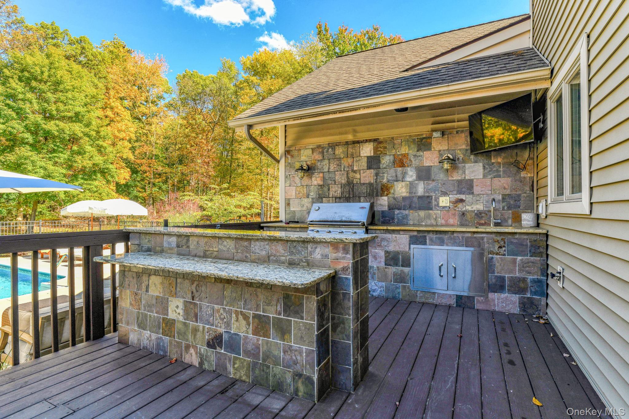 54 Borden Road Walden, NY 12586 - Photo 32 of 46 a kitchen with a sink and wooden floor
