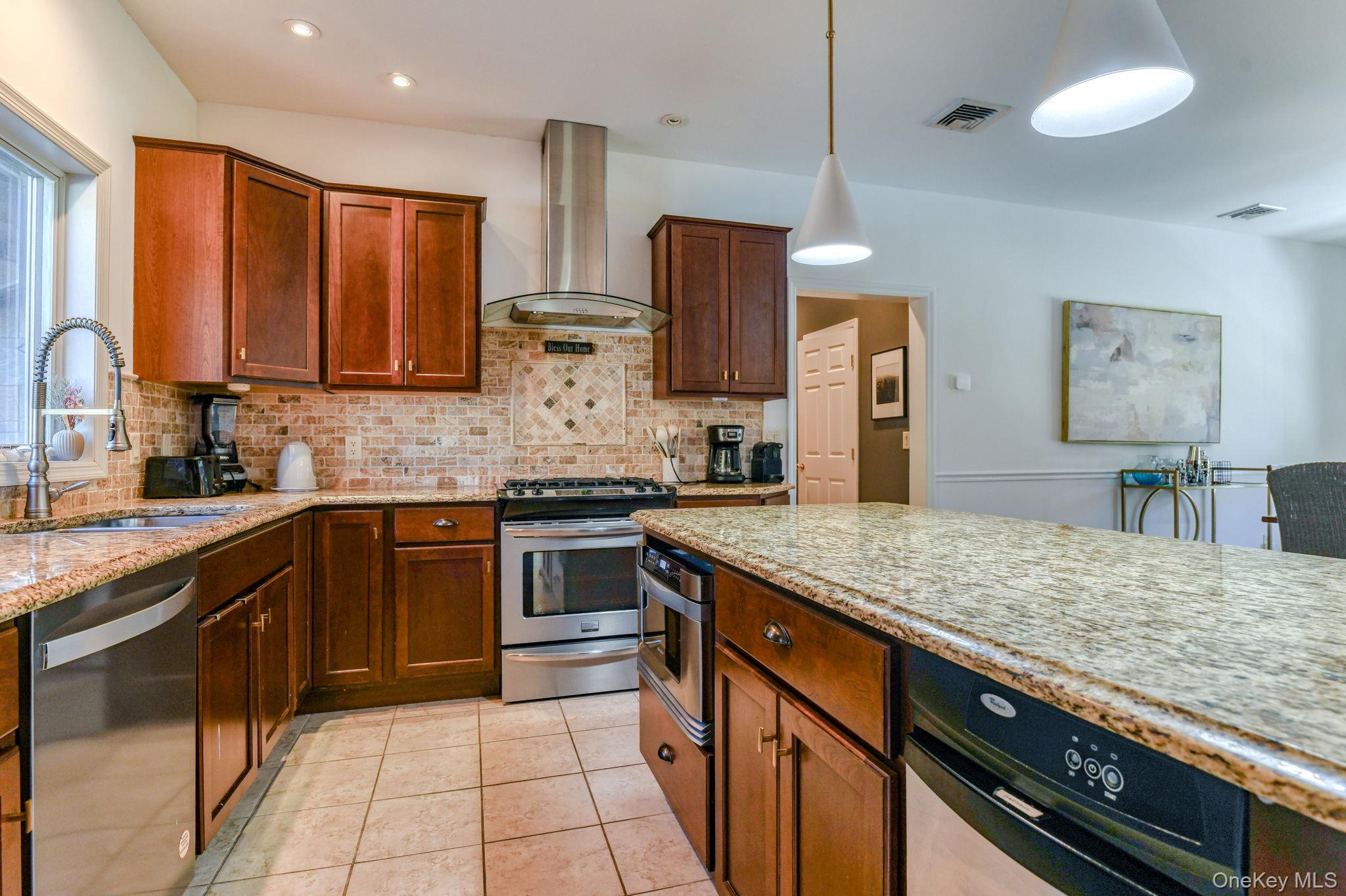 54 Borden Road Walden, NY 12586 - Photo 8 of 46 a kitchen with stainless steel appliances granite countertop a sink stove and cabinets