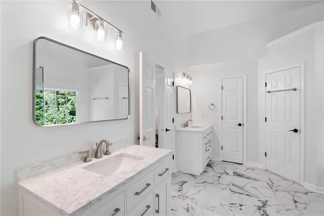 a room with a bed and a window