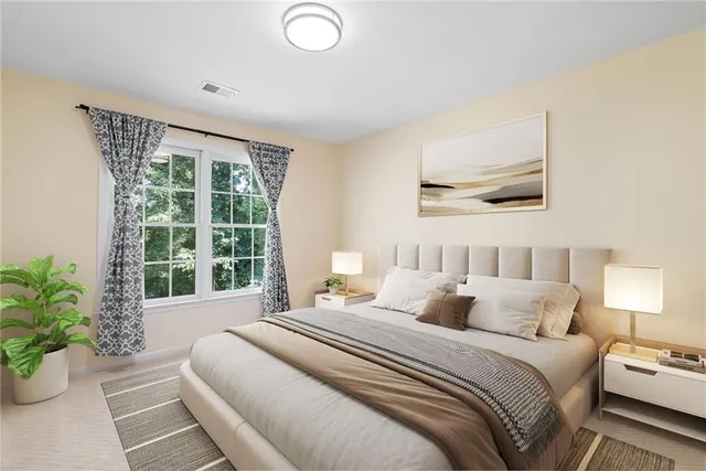 a view of a livingroom with a chandelier fan