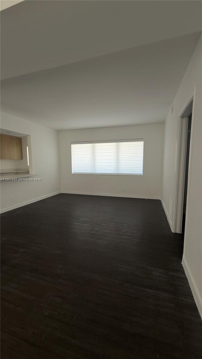 2000 Southwest 13th Court Miami, FL 33145 - Photo 12 of 22 a view of wooden floor and windows in a room