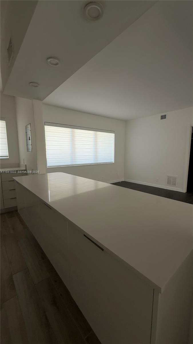 2000 Southwest 13th Court Miami, FL 33145 - Photo 7 of 22 a view of an empty room and window