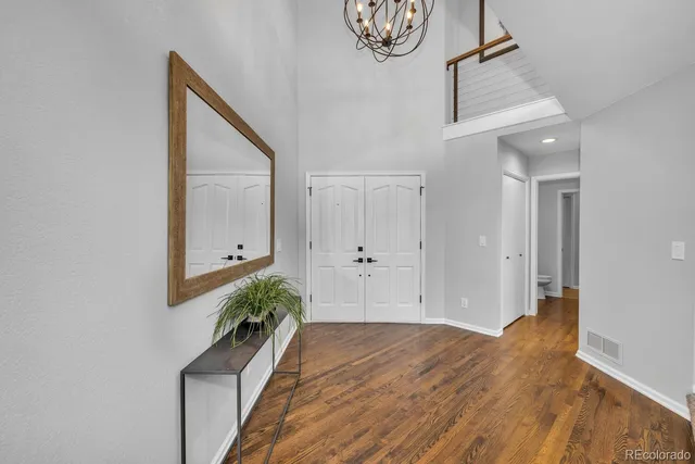 a view of entryway with wooden floor