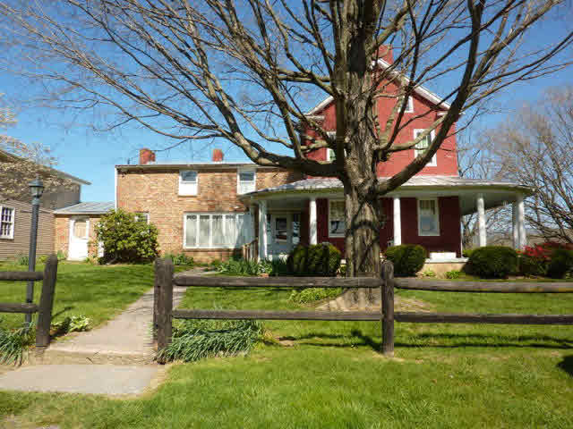 210 Wolf Ridge Road Bridgewater, VA 22812 - Photo 1 of 12 a front view of a house with a yard