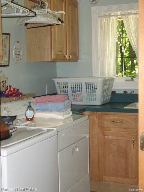 693 Francis Road Howell, MI 48843 - Photo 14 of 25 first floor laundry