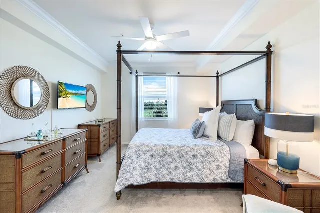 a bedroom with a bed and a dresser in it