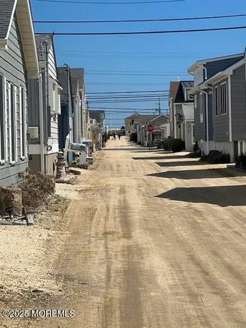 a view of a building with sitting area